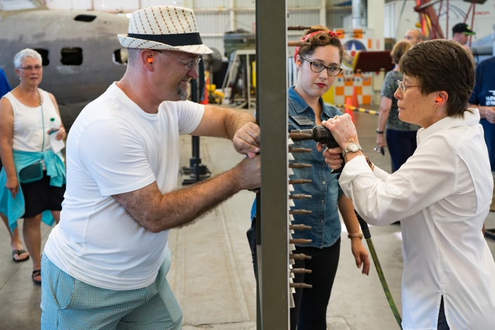 Teachers Experiencing Riveting At The Pacific Aviation Museum